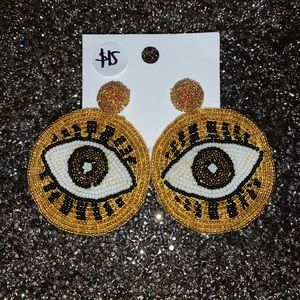 Yellow eye earrings